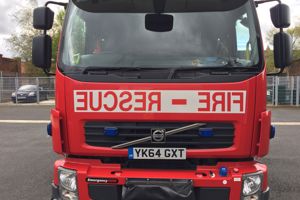 Fire crews rescue man trapped by fork lift