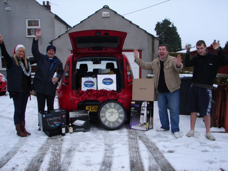 Chris and Nikki and the Winning Family with all thier fab prizes!