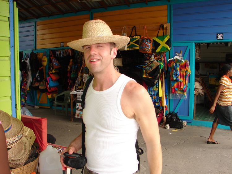 Alex finds a straw hat at the local craft market