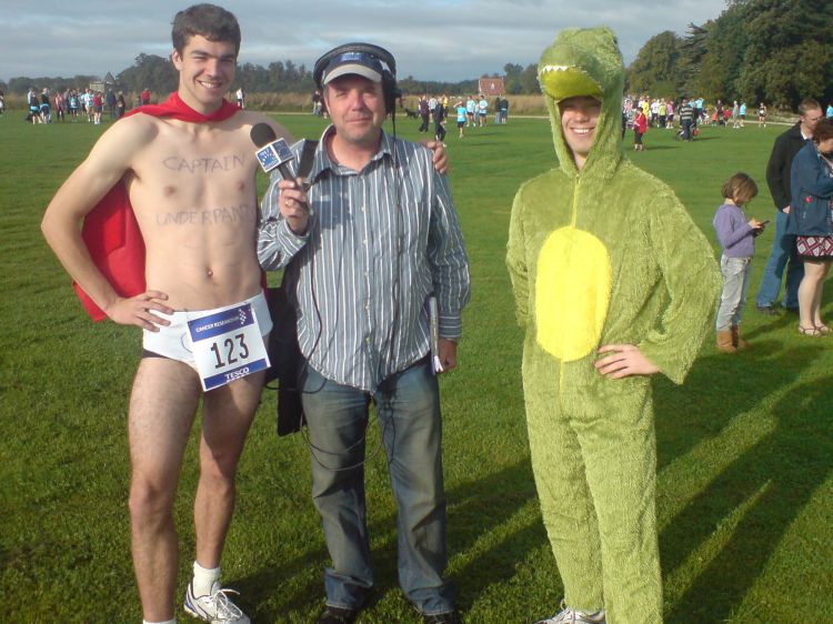 John poses with two of the runners.